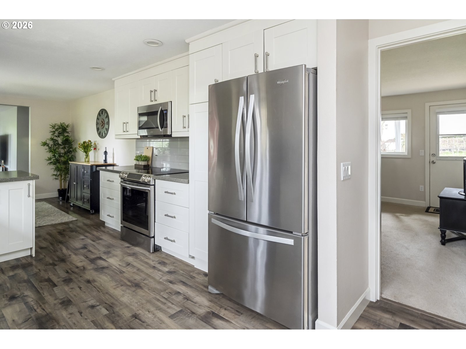 2520 Southwest Towle Avenue Gresham, OR 97080 - Photo 22 of 33 a kitchen with stainless steel appliances a refrigerator sink and stove