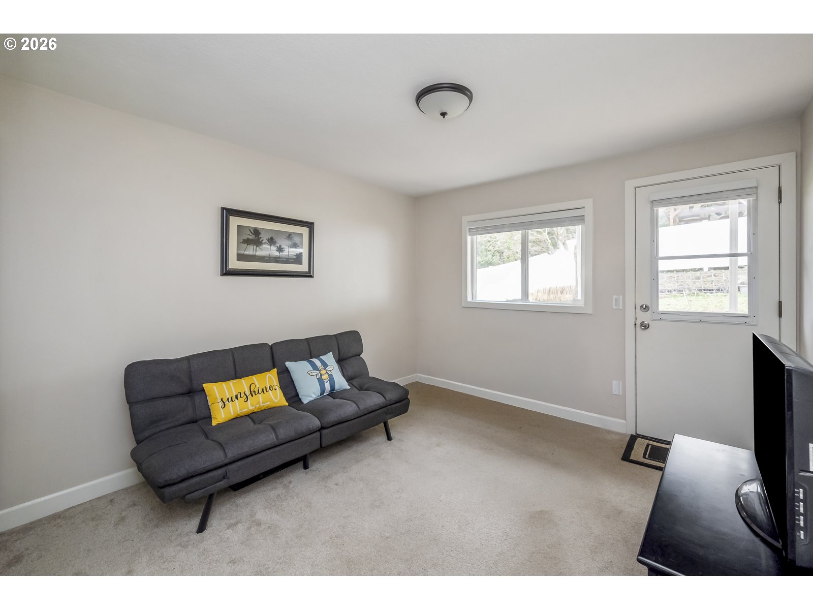 2520 Southwest Towle Avenue Gresham, OR 97080 - Photo 23 of 33 a living room with furniture and a flat screen tv