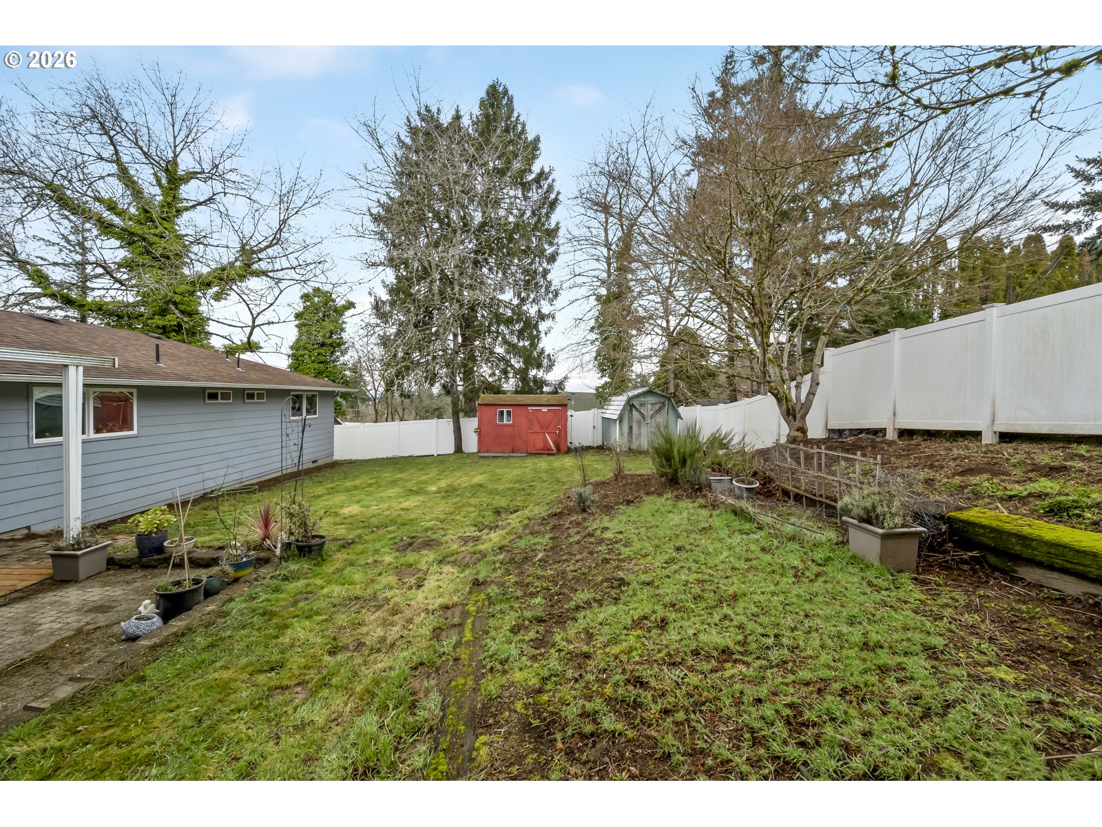 2520 Southwest Towle Avenue Gresham, OR 97080 - Photo 29 of 33 a backyard of a house with lots of green space