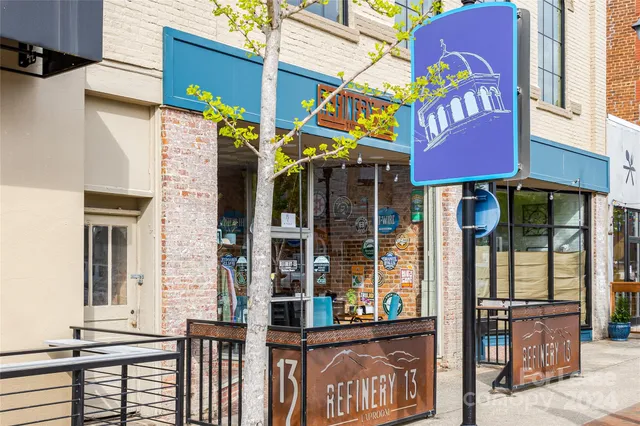 a view of street with sitting area
