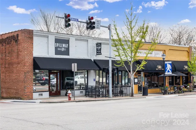 a view of street with shops