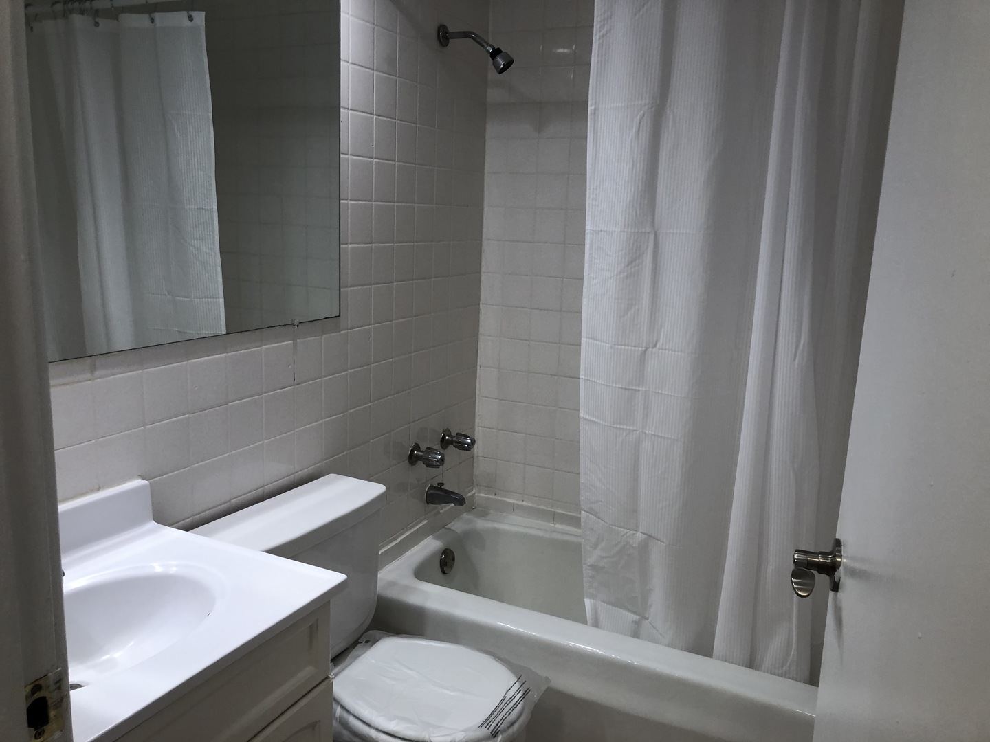 536 West Addison Street, Unit 391 Chicago, IL 60613 - Photo 4 of 6 a bathroom with a sink toilet and shower