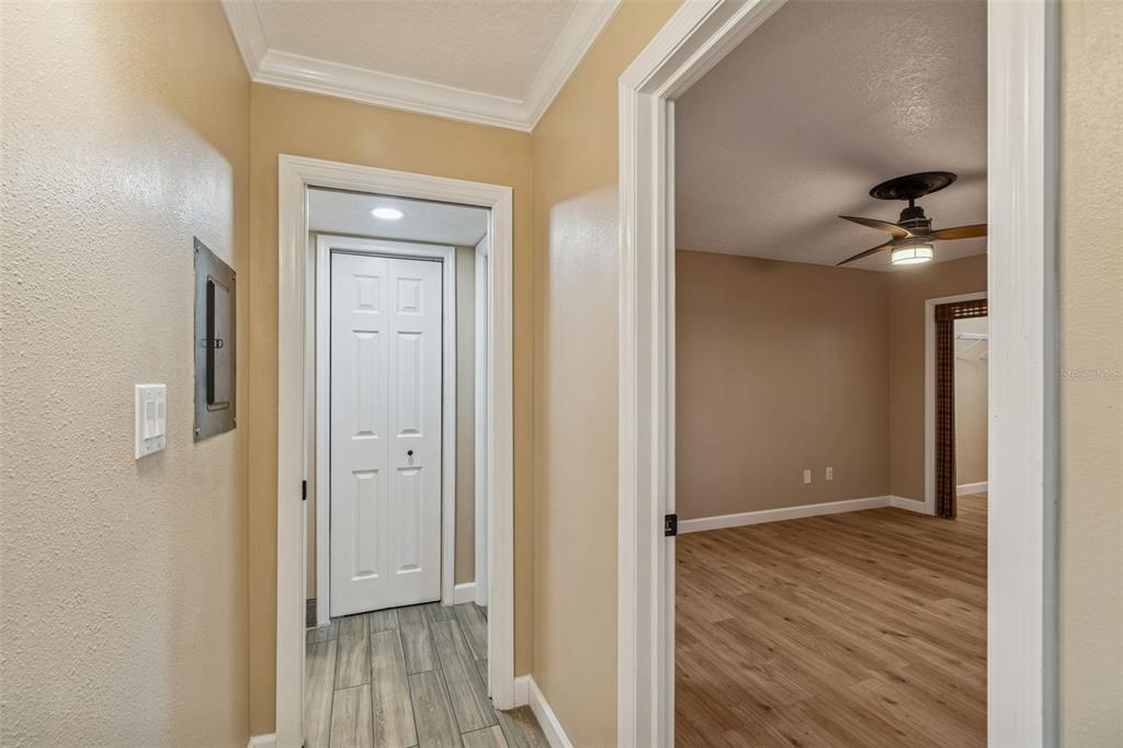 4937 Marine Parkway, Unit 105 New Port Richey, FL 34652 - Photo 17 of 50 a view of a hallway with wooden floor