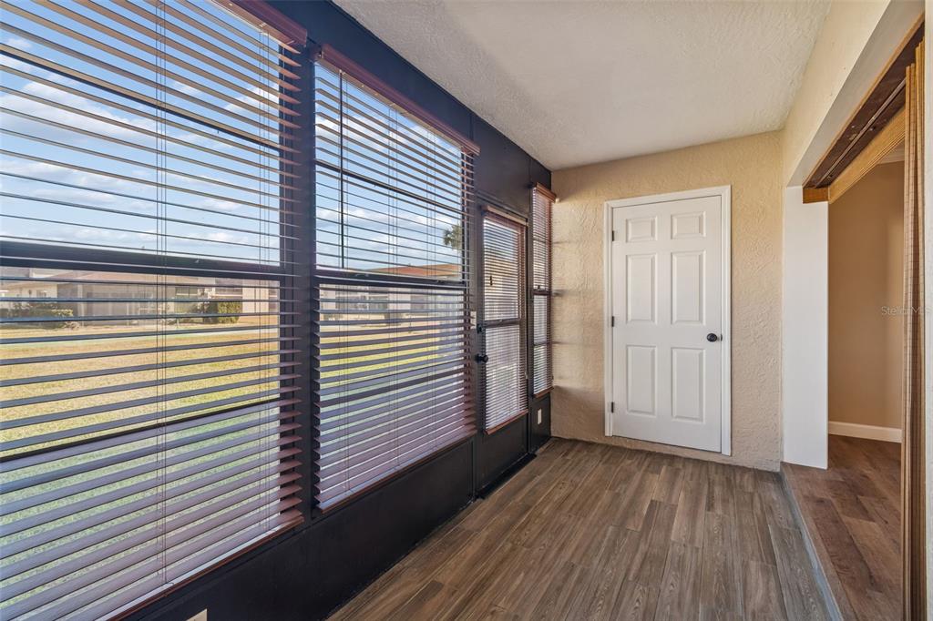 4937 Marine Parkway, Unit 105 New Port Richey, FL 34652 - Photo 26 of 50 a view of a room with wooden floor