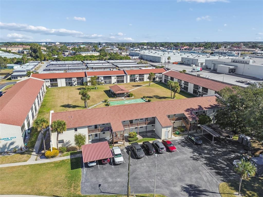 4937 Marine Parkway, Unit 105 New Port Richey, FL 34652 - Photo 39 of 50 an aerial view of residential houses and outdoor space