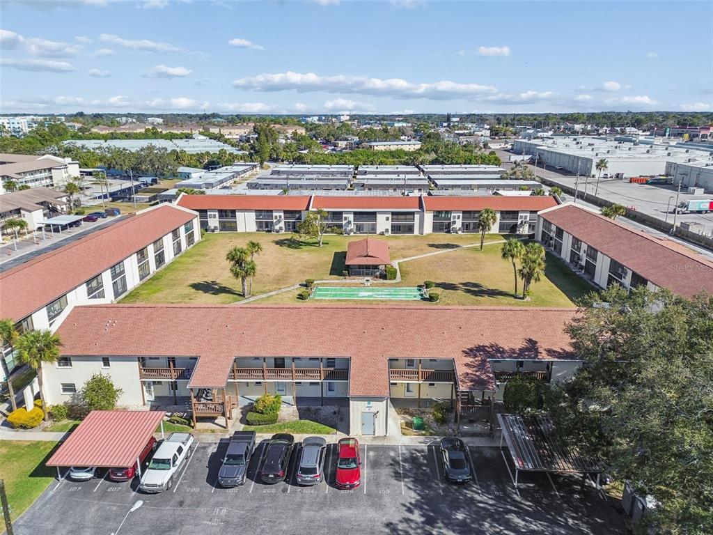 4937 Marine Parkway, Unit 105 New Port Richey, FL 34652 - Photo 40 of 50 an aerial view of a house with a lake view