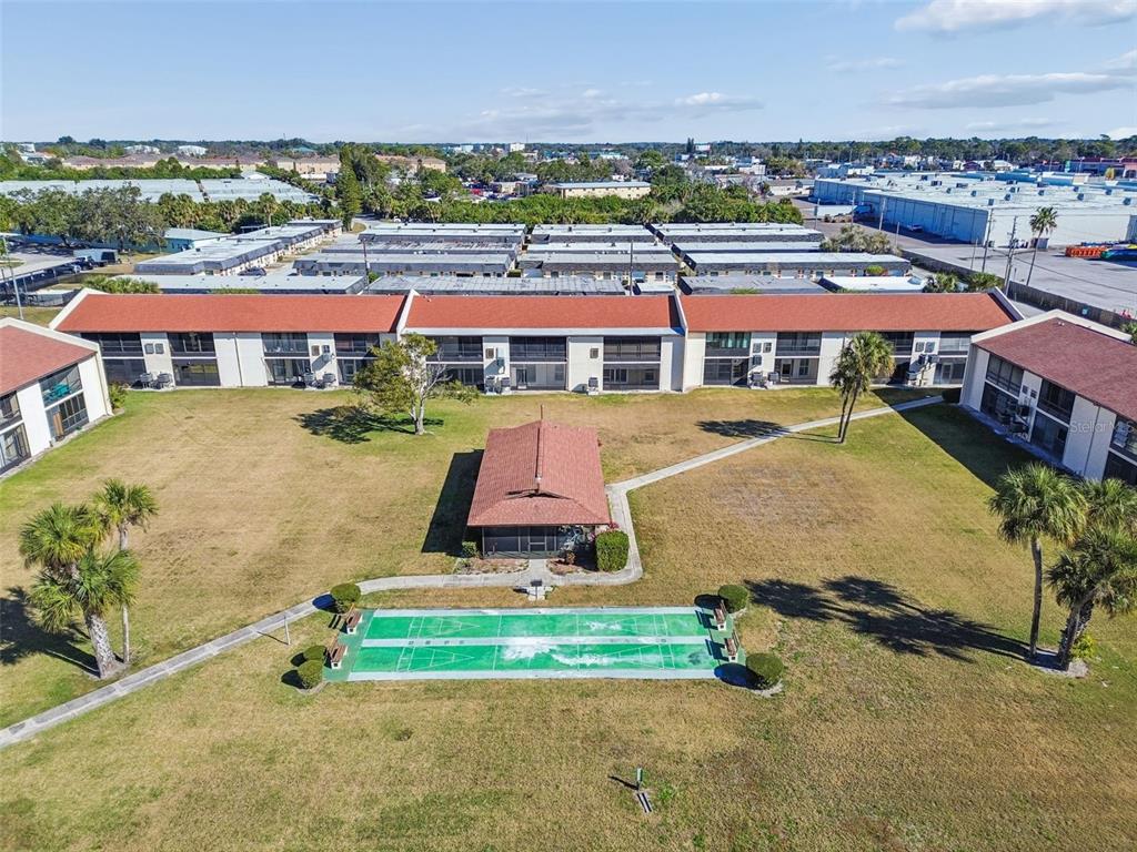 4937 Marine Parkway, Unit 105 New Port Richey, FL 34652 - Photo 41 of 50 an aerial view of residential houses and outdoor space