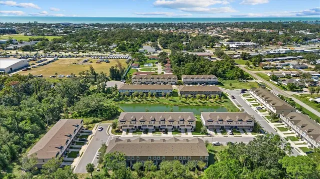 an aerial view of a house with a garden