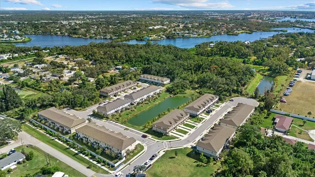an aerial view of a city with lots of residential buildings