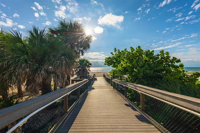 a view of balcony and yard