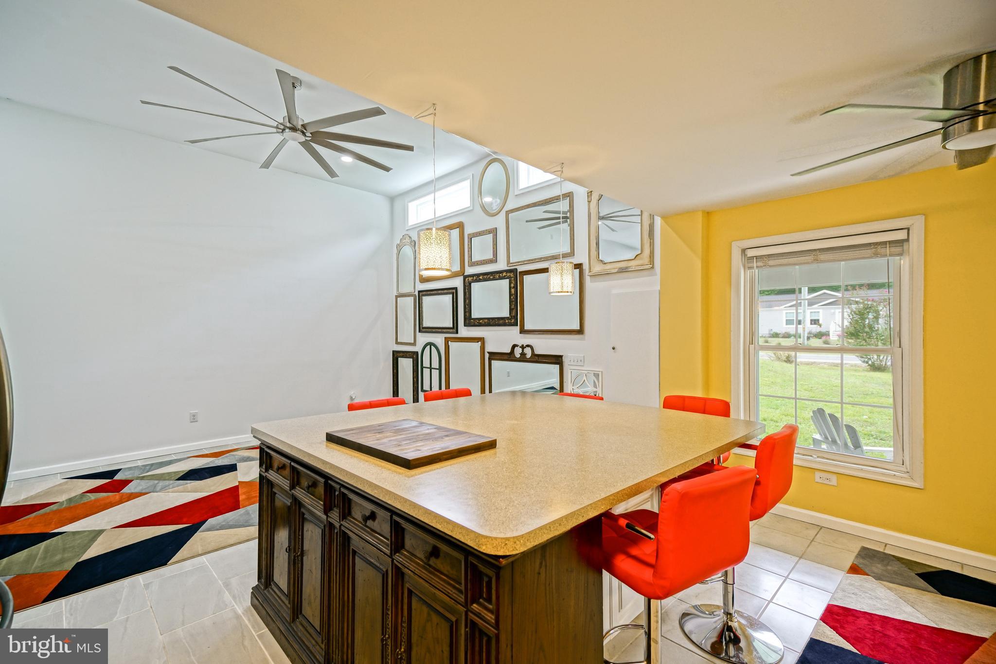 18897 Sand Hill Road Milton, DE 19968 - Photo 13 of 51 a view of a dining room with furniture and a window
