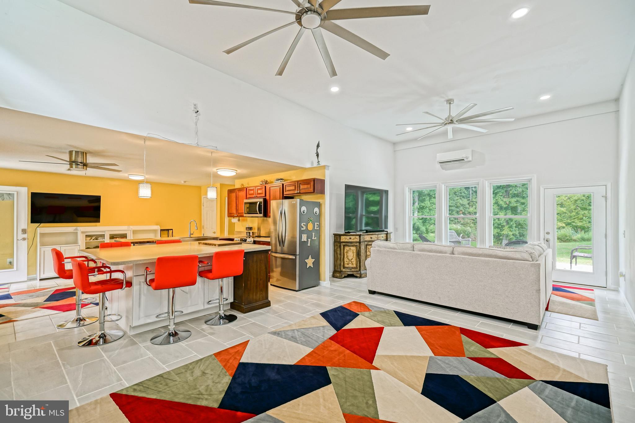 18897 Sand Hill Road Milton, DE 19968 - Photo 16 of 51 a living room with a couch and a coffee table