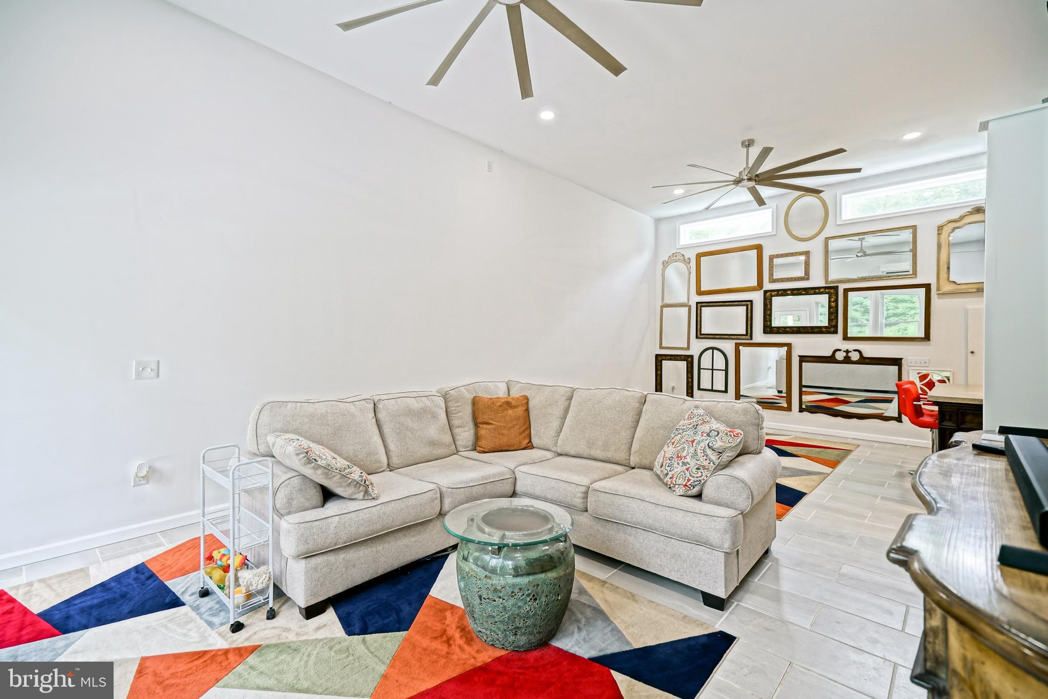 18897 Sand Hill Road Milton, DE 19968 - Photo 20 of 51 a living room with furniture and a flat screen tv