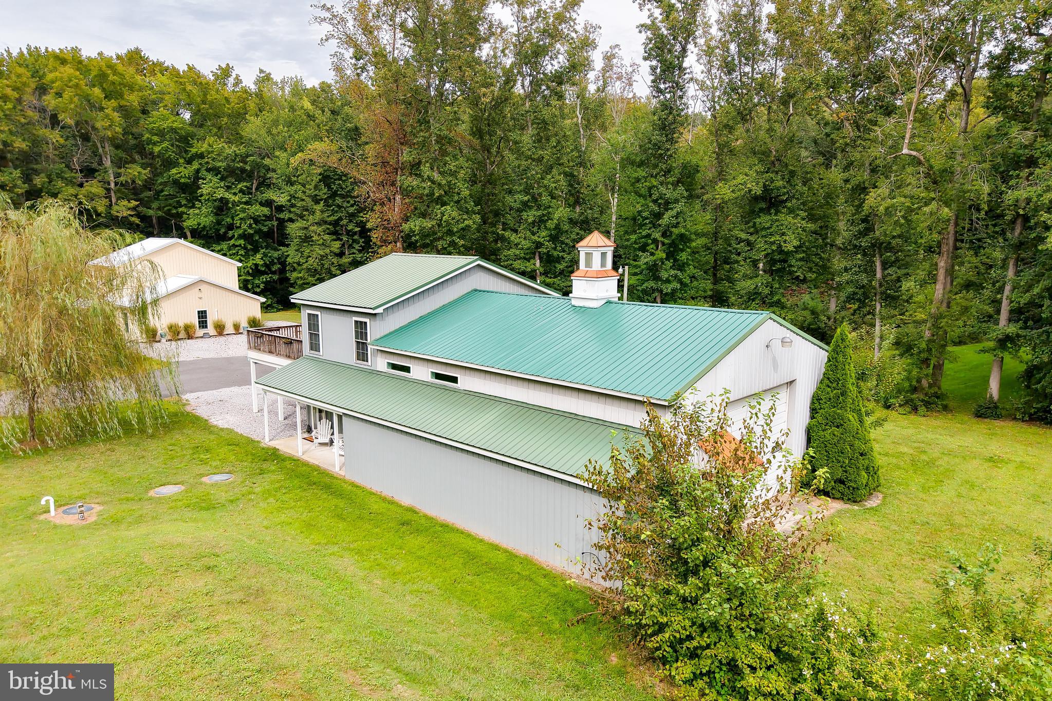 18897 Sand Hill Road Milton, DE 19968 - Photo 2 of 51 a view of a pool with a yard