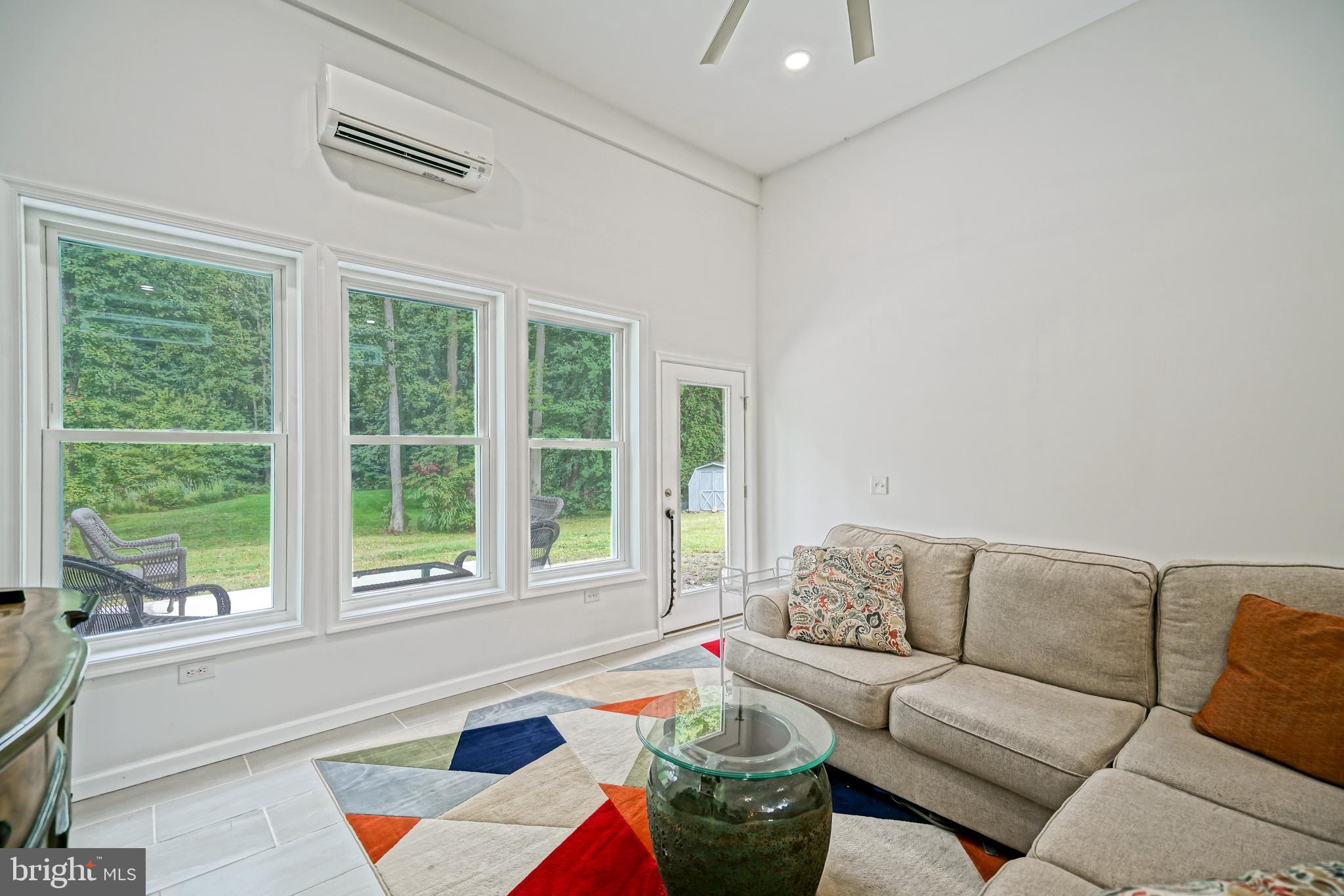 18897 Sand Hill Road Milton, DE 19968 - Photo 21 of 51 a living room with furniture and a window