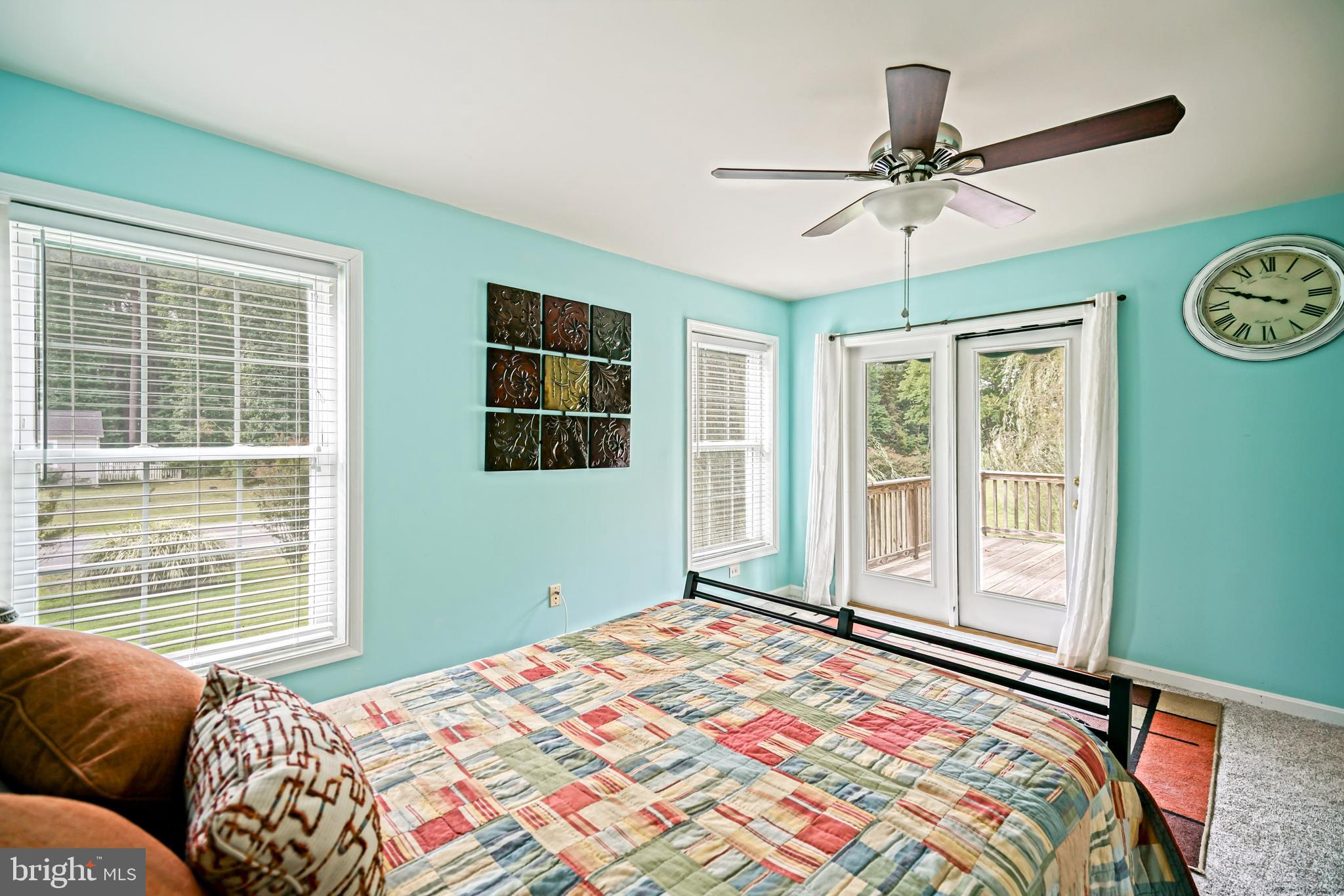 18897 Sand Hill Road Milton, DE 19968 - Photo 31 of 51 a bedroom with a large bed and a window