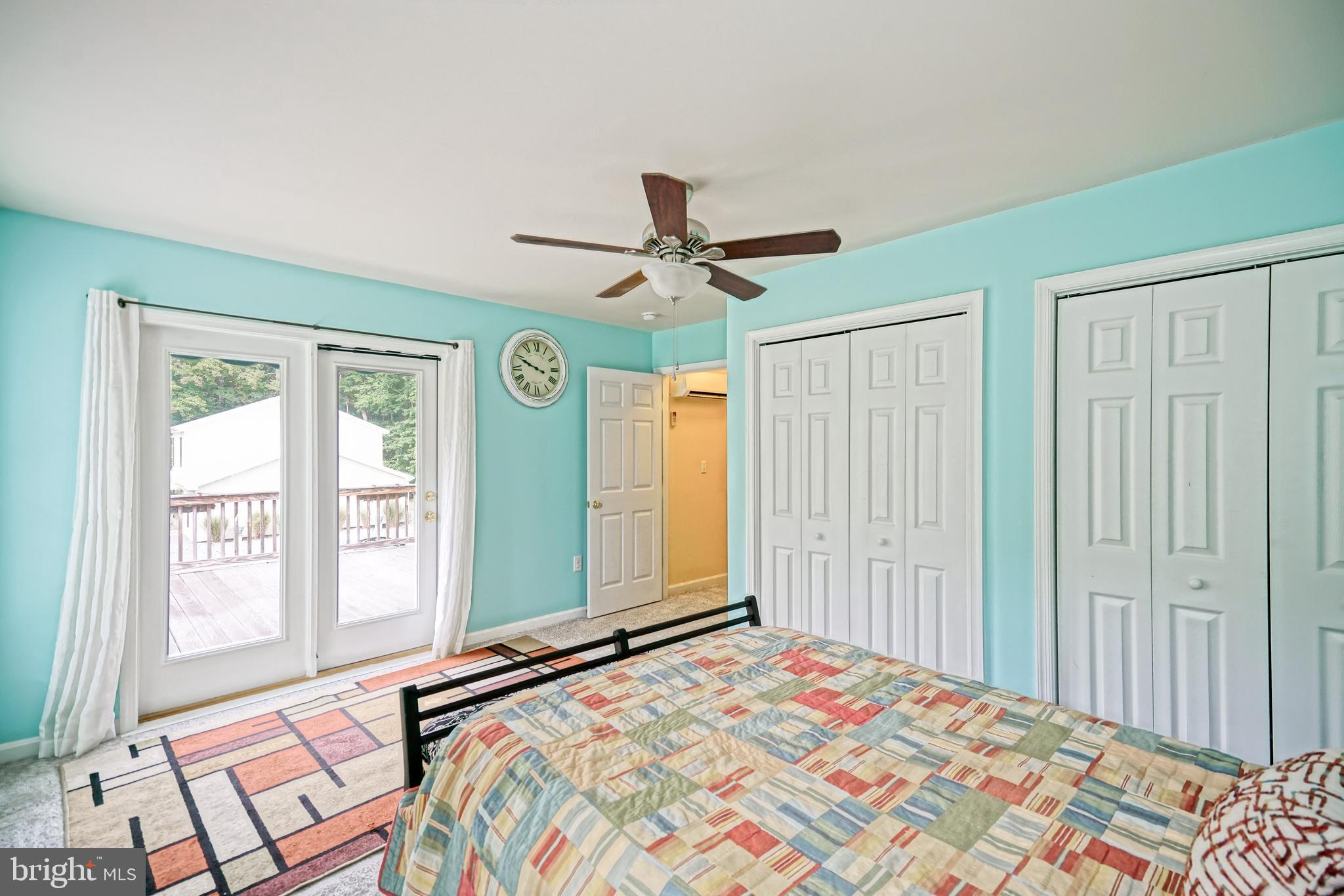 18897 Sand Hill Road Milton, DE 19968 - Photo 32 of 51 a bedroom with a bed and a window