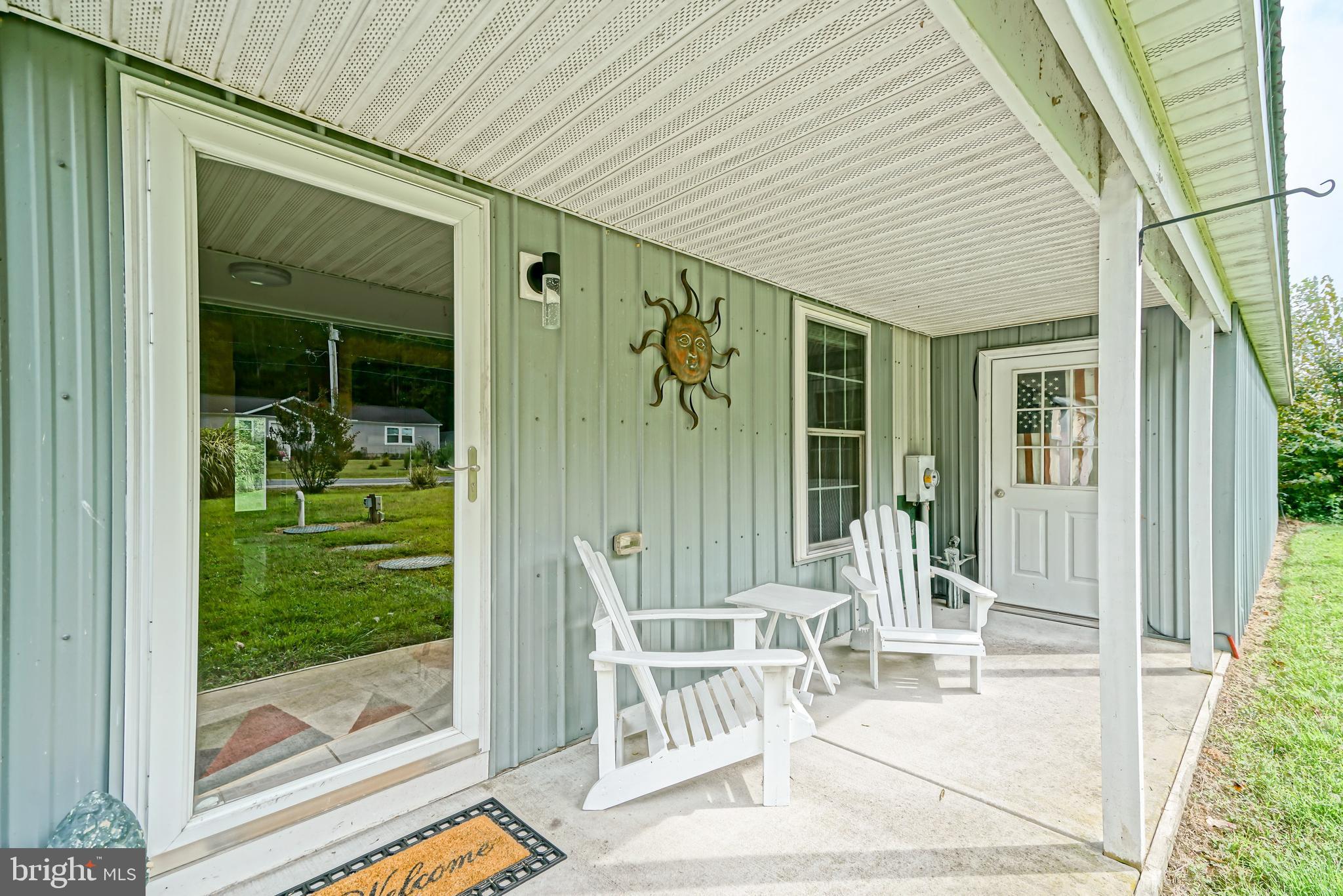 18897 Sand Hill Road Milton, DE 19968 - Photo 6 of 51 a house view with a outdoor space