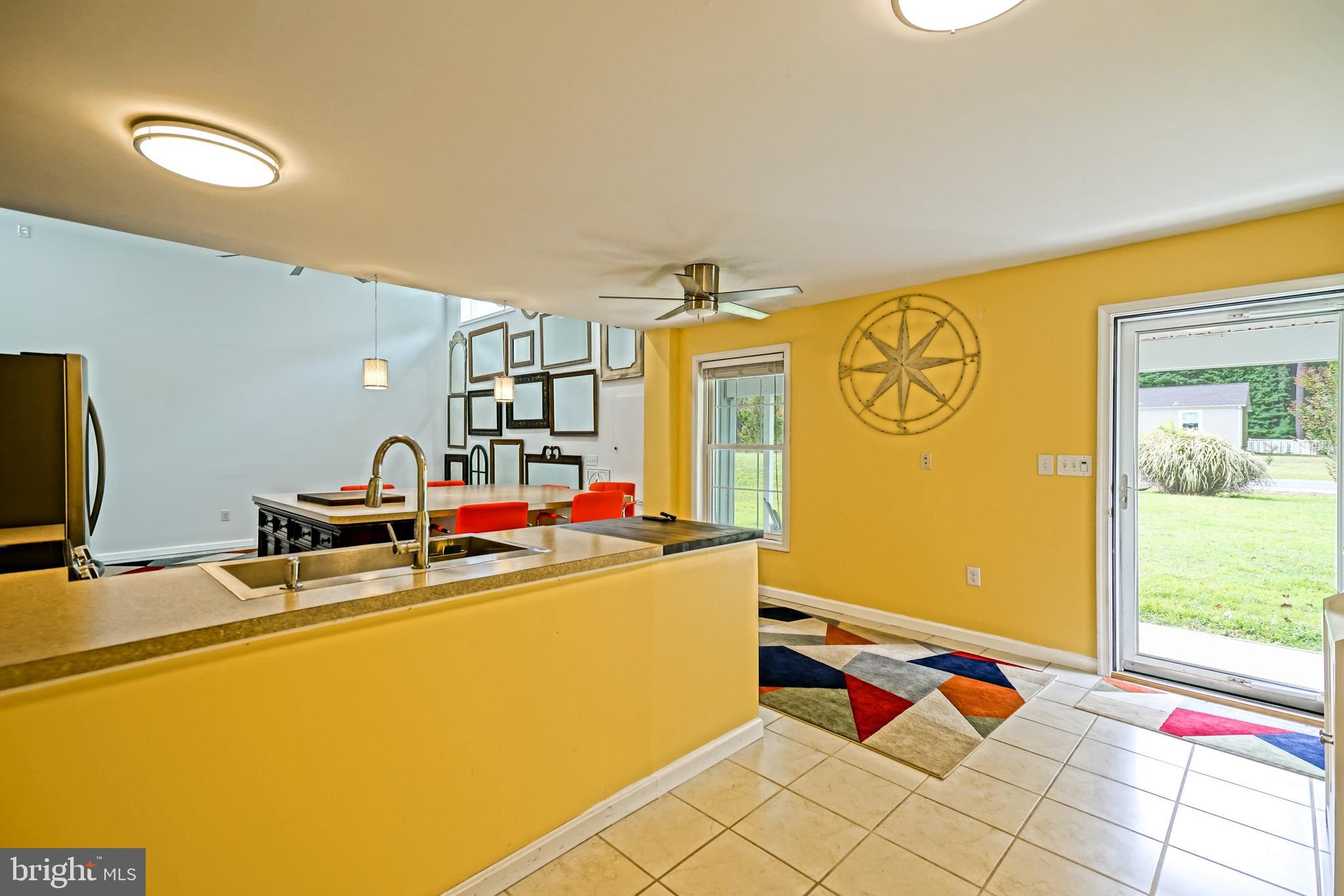 18897 Sand Hill Road Milton, DE 19968 - Photo 7 of 51 a room with furniture and gym equipment
