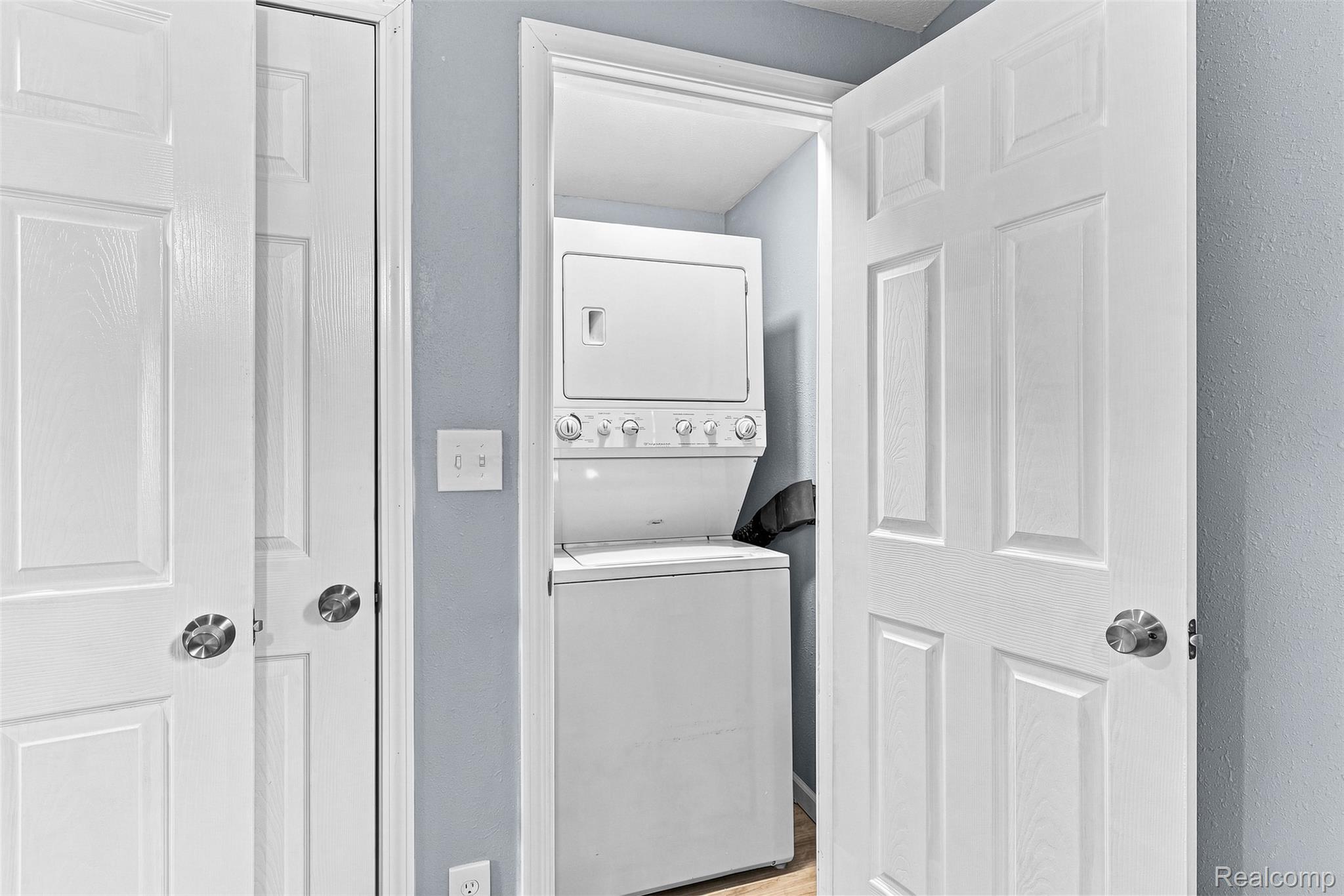 6163 North State Road Davison, MI 48423 - Photo 26 of 45 White stacked washer and dryer unit