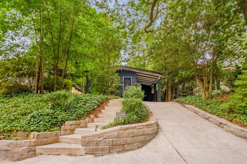 2099 Lenox Road Northeast Atlanta, GA 30324 - Photo 1 of 1 a view of house with a yard