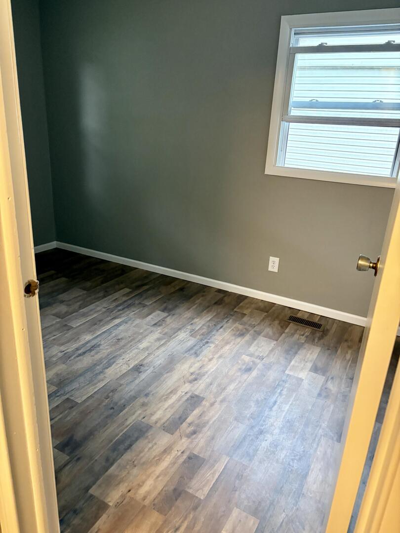 1401 Dillon Drive Normal, IL 61761 - Photo 12 of 17 a view of an empty room and window