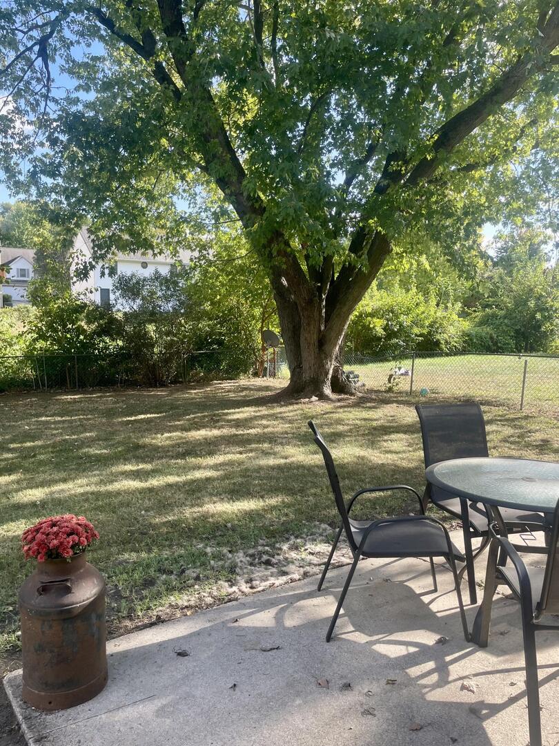 1401 Dillon Drive Normal, IL 61761 - Photo 15 of 17 a view of a lake from a patio