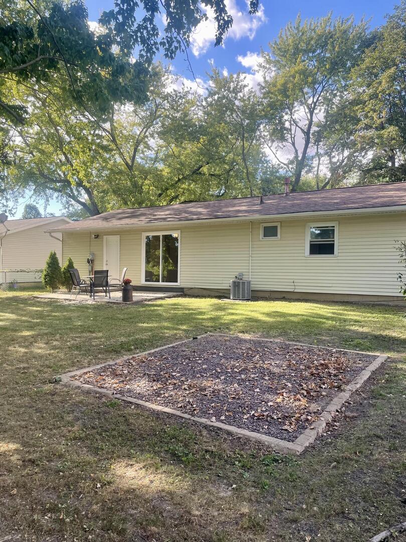 1401 Dillon Drive Normal, IL 61761 - Photo 16 of 17 a view of a house with a yard