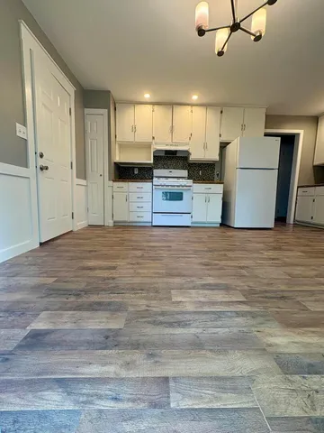 a view of a kitchen with a sink