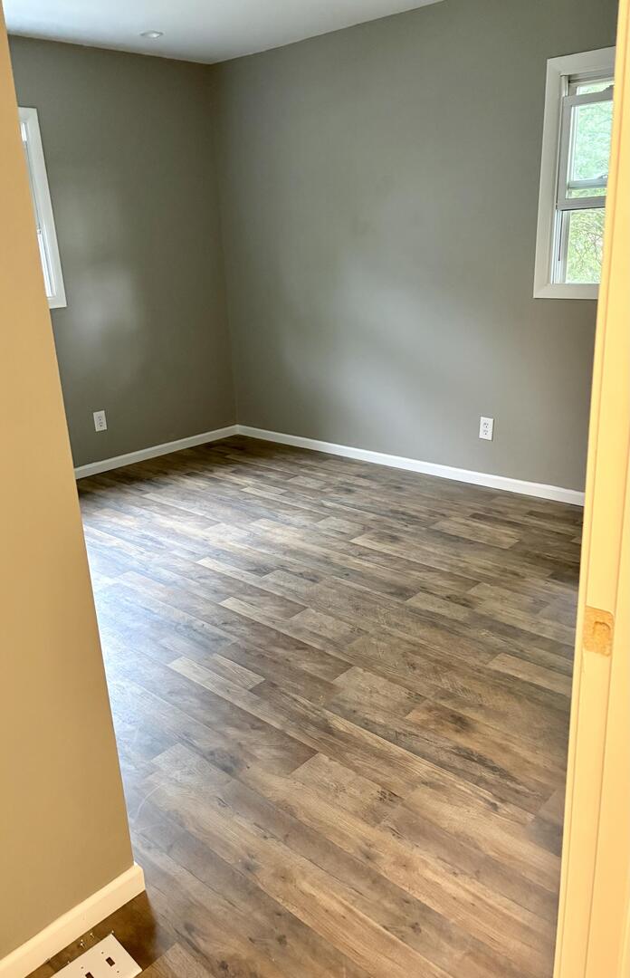 1401 Dillon Drive Normal, IL 61761 - Photo 10 of 17 a view of empty room with wooden floor