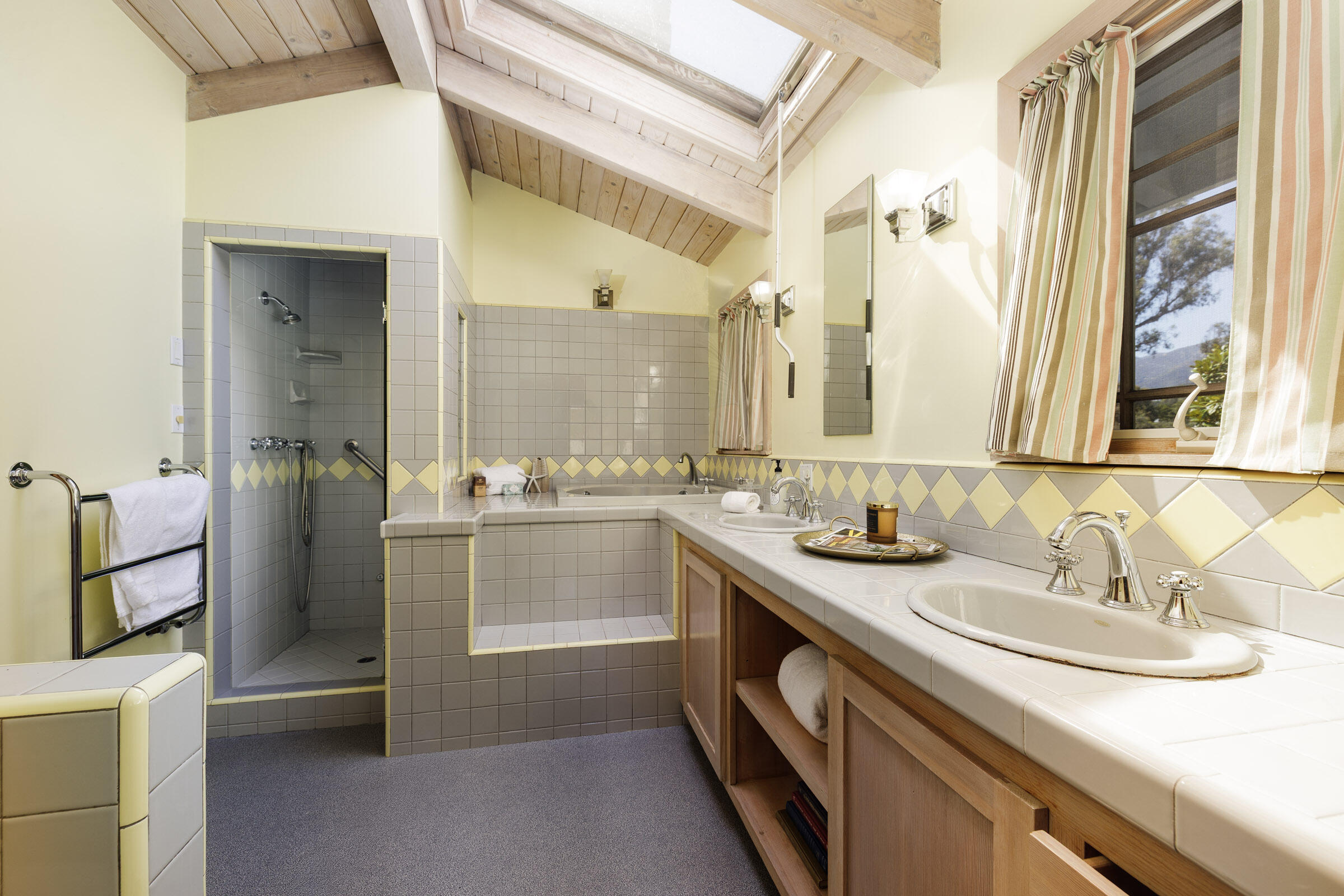 1114 Hill Road Montecito, CA 93108 - Photo 15 of 27 a bathroom with a sink and a mirror