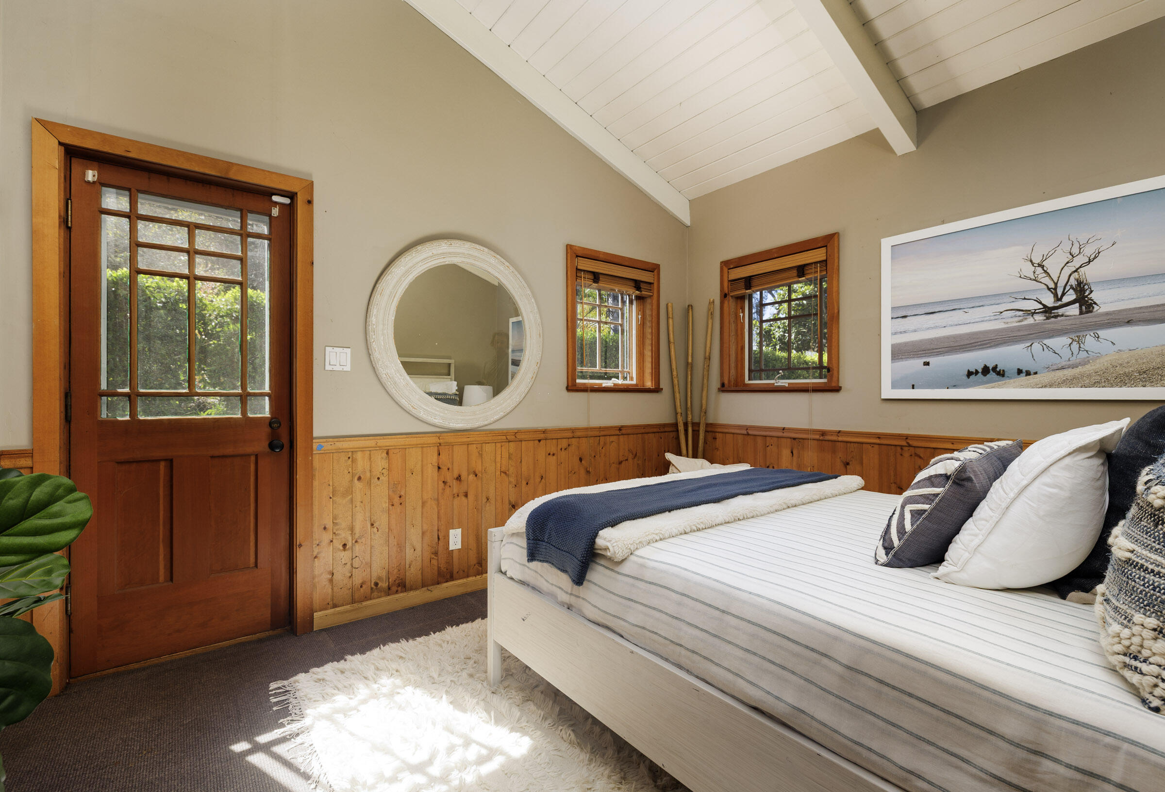 1114 Hill Road Montecito, CA 93108 - Photo 18 of 27 a bedroom with a bed and a painting on the wall