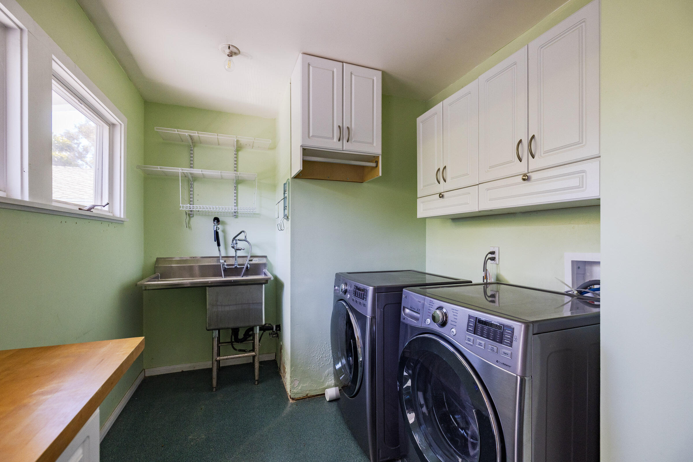 1114 Hill Road Montecito, CA 93108 - Photo 23 of 27 a view of a room with washer and dryer