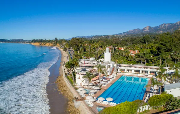 a view of a street with an ocean view