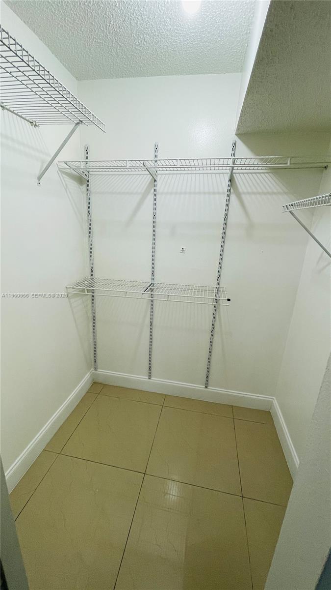 8350 Sands Point Boulevard, Unit E204 Tamarac, FL 33321 - Photo 18 of 25