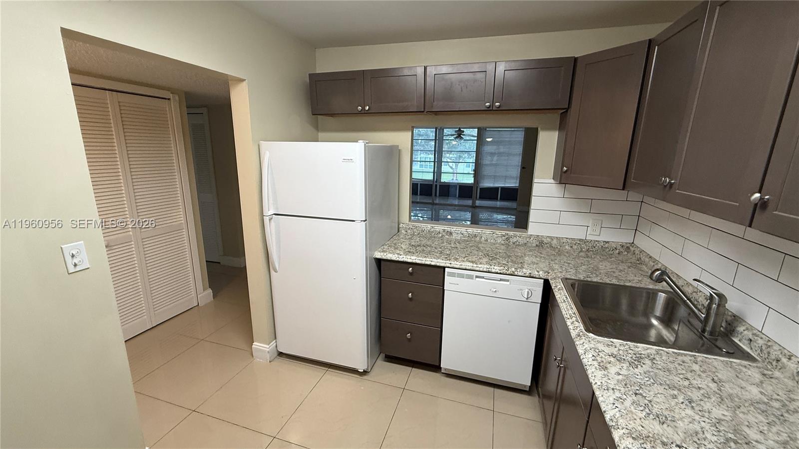 8350 Sands Point Boulevard, Unit E204 Tamarac, FL 33321 - Photo 3 of 25