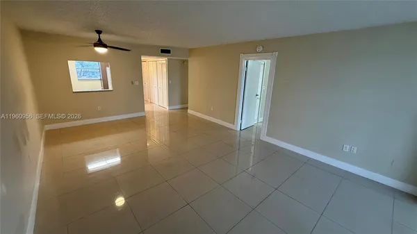 a view of an empty room and window