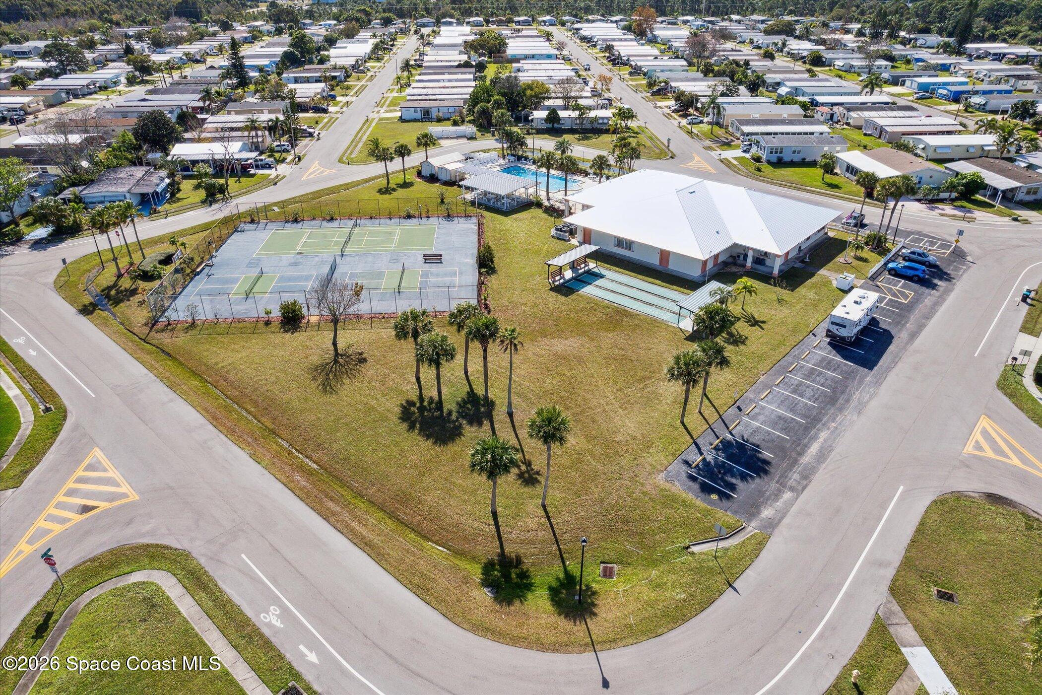 1854 Mango Street Northeast Palm Bay, FL 32905 - Photo 30 of 35 a view of a swimming pool with a chairs
