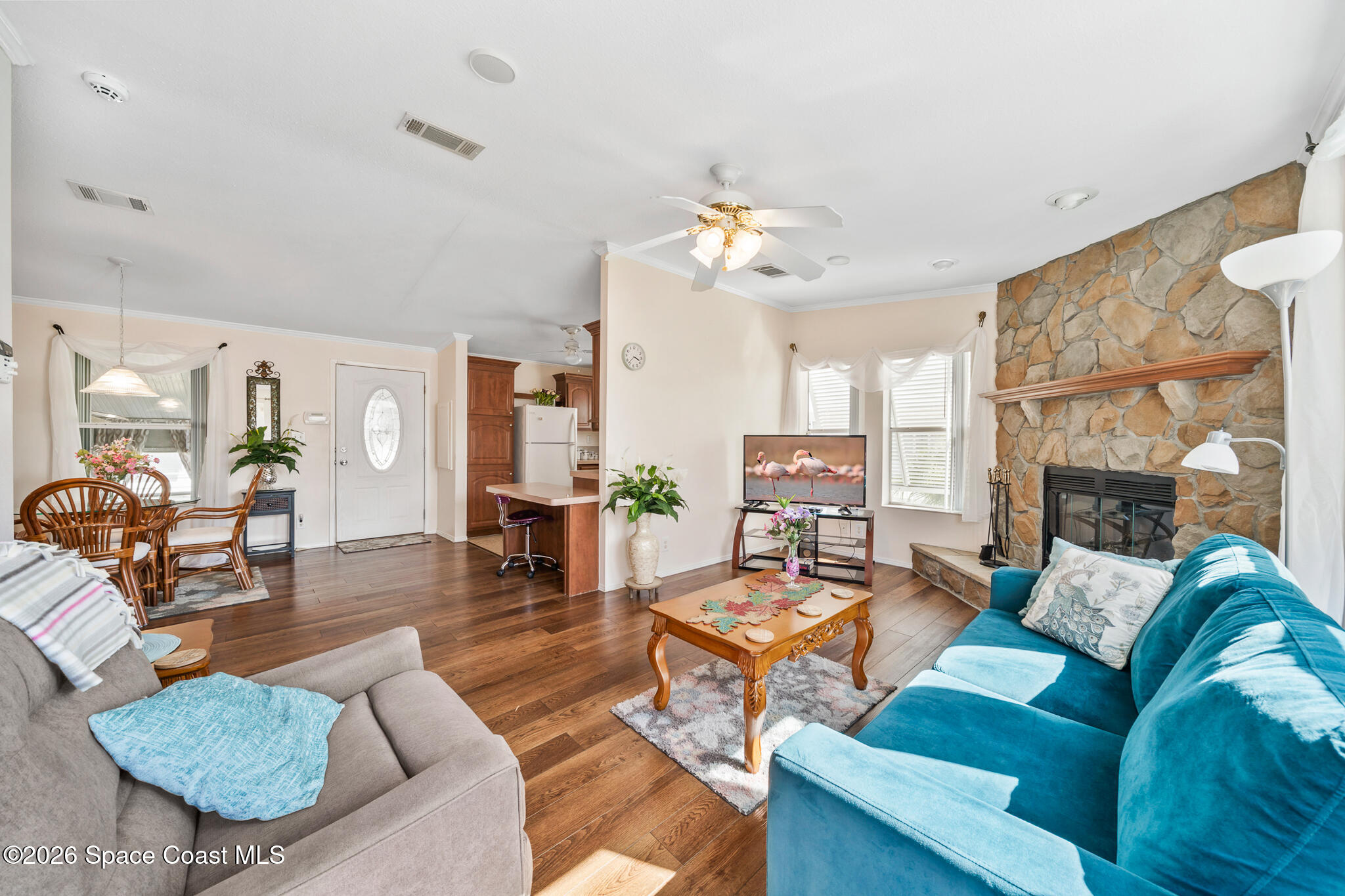 1854 Mango Street Northeast Palm Bay, FL 32905 - Photo 10 of 35 a living room with fireplace furniture and a fireplace