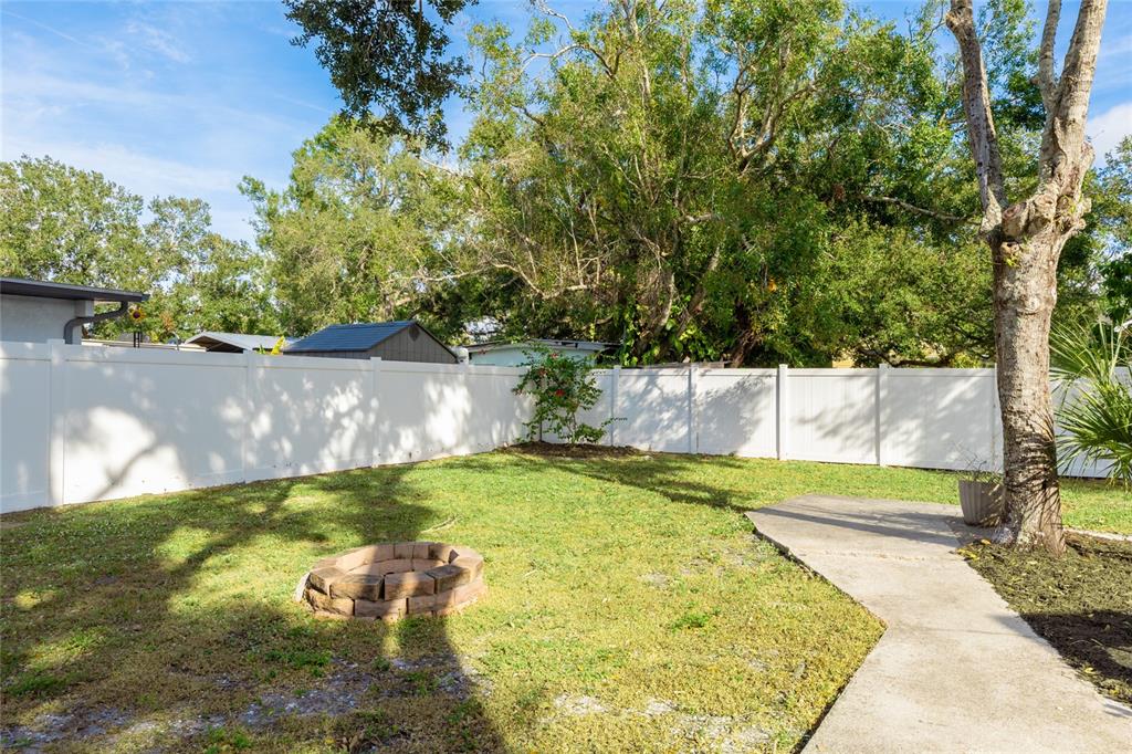 3011 6th Street Sarasota, FL 34237 - Photo 23 of 23 a view of a swimming pool with a yard