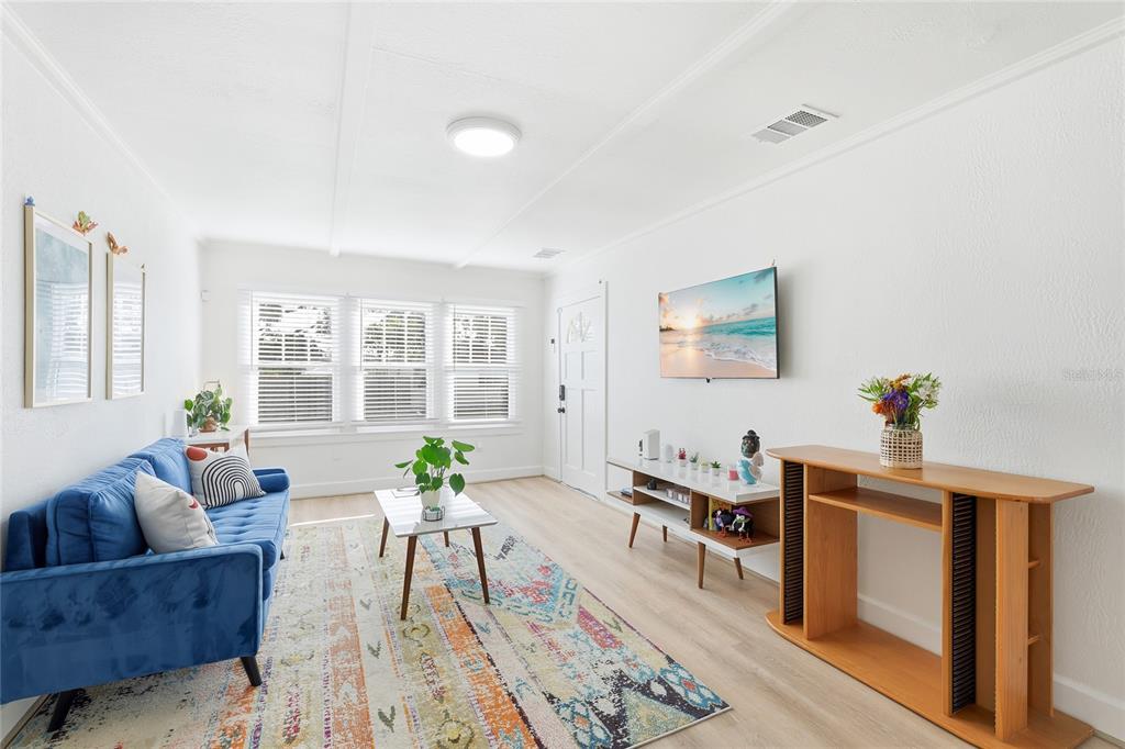 3011 6th Street Sarasota, FL 34237 - Photo 8 of 23 a living room with furniture and wooden floor