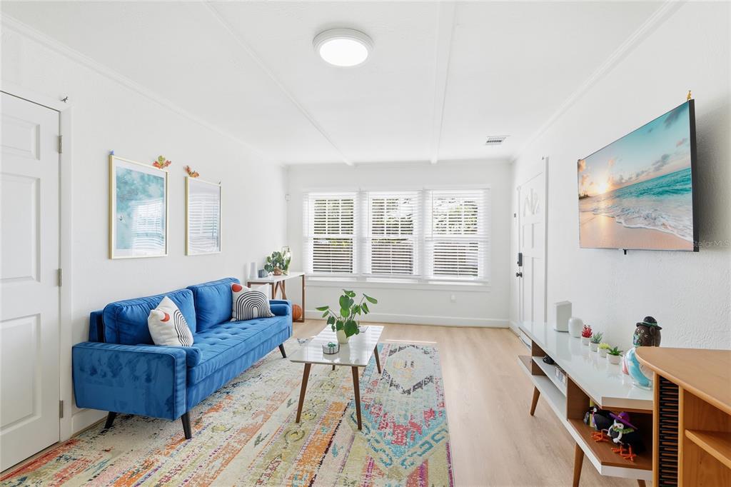 3011 6th Street Sarasota, FL 34237 - Photo 10 of 23 a living room with furniture and a flat screen tv