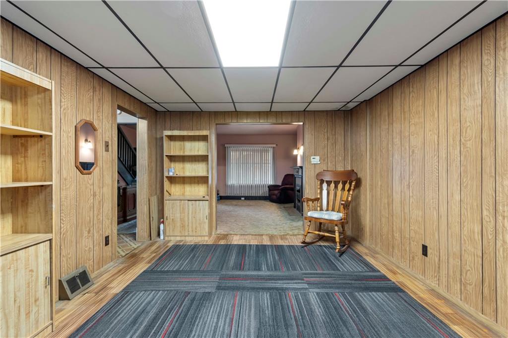 24 High Street Pittsburgh, PA 15223 - Photo 3 of 12 a view of a room with wooden floor and staircase