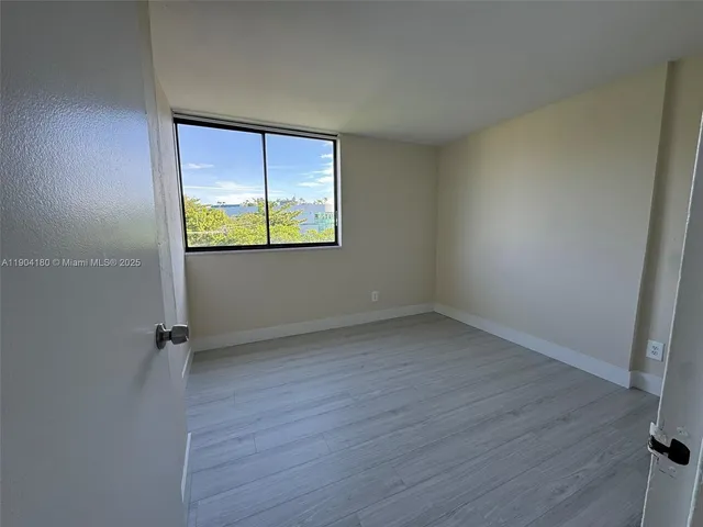 an empty room with window