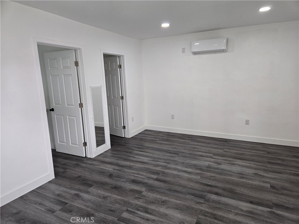 5327 Tyler Street, Unit B Riverside, CA 92503 - Photo 2 of 4 an empty room with wooden floor and entrance