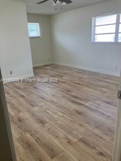 6181 Southwest 41st Court, Unit 1 Davie, FL 33314 - Photo 14 of 26 Wood Laminate flooring in Primary Bedroom