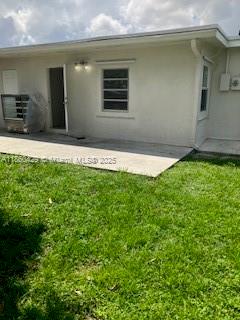 6181 Southwest 41st Court, Unit 1 Davie, FL 33314 - Photo 24 of 26 back Patio