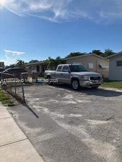 6181 Southwest 41st Court, Unit 1 Davie, FL 33314 - Photo 3 of 26 Two assigned parking spots inside gate
