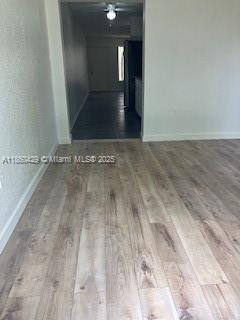 6181 Southwest 41st Court, Unit 1 Davie, FL 33314 - Photo 10 of 26 View from Family Room into galley kitchen