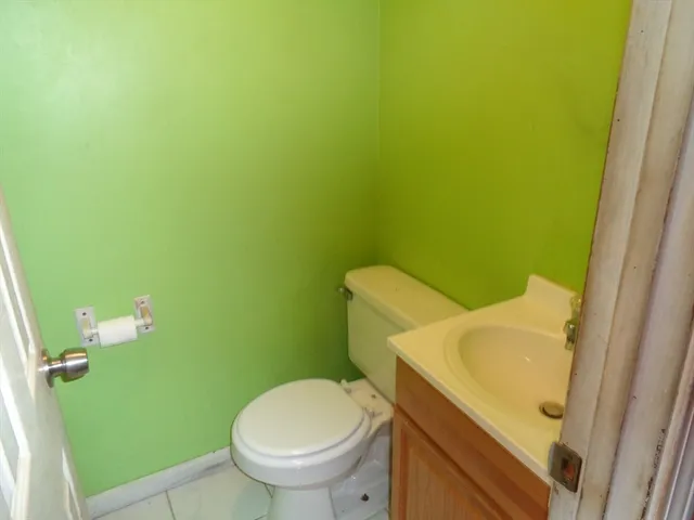 a bathroom with a sink and toilet